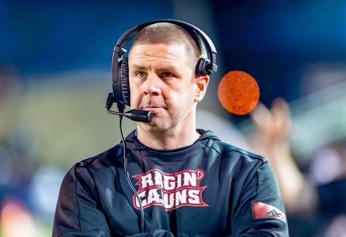 Louisiana coach Billy Napier looks on